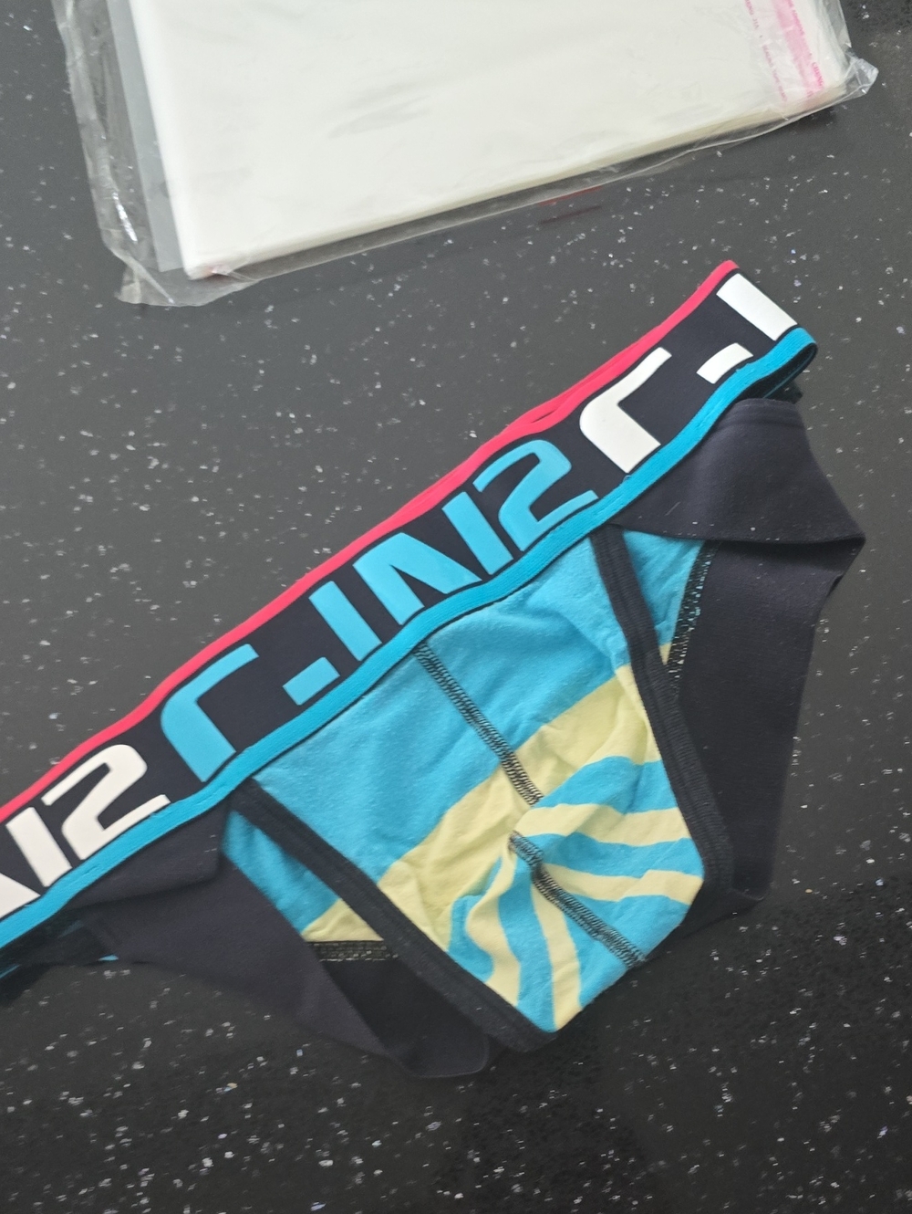 Men’s Turquoise & Black Swim Trunks with Pink-Trim Waistband
